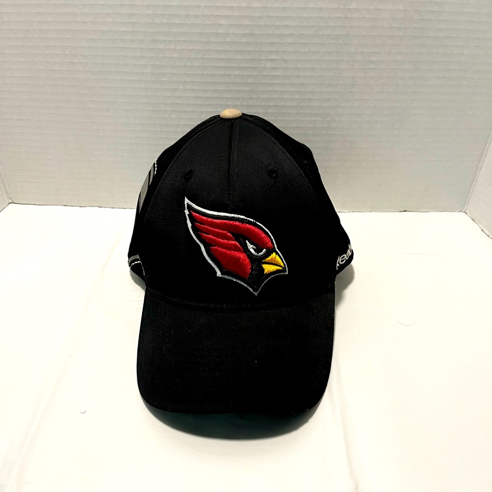 This is an NFL fitted hat, small in good condition black from Reebok
